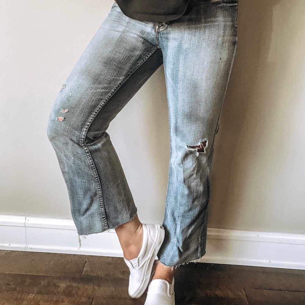 BUCKLE medium-light wash denim.